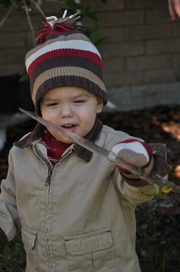 Jackson holding ice from our yard