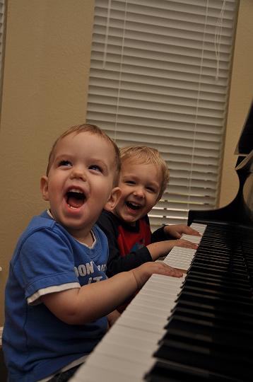 Jackson & Carter playing piano